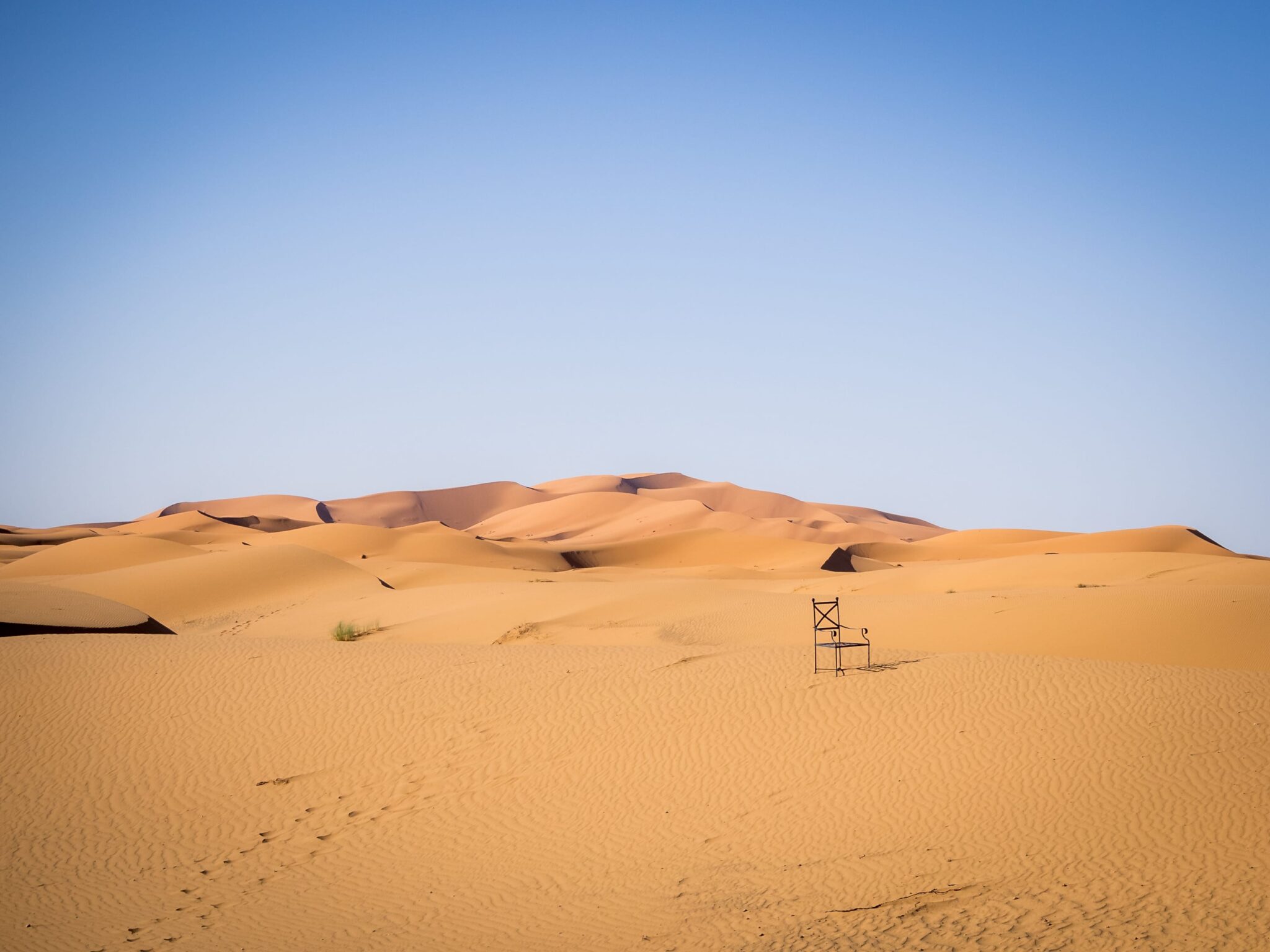Sahara desert under the sunlight and a blue sky in Morocco in Africa